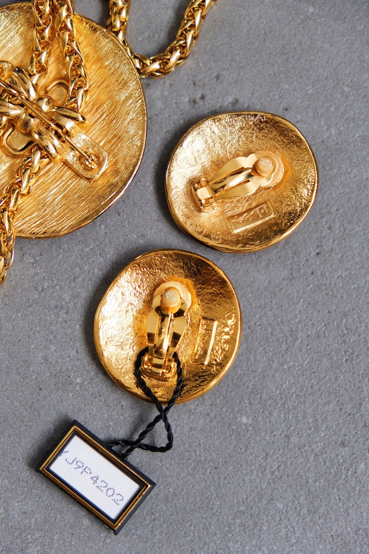 Yves Saint Laurent shell necklace and earclips jewelry set