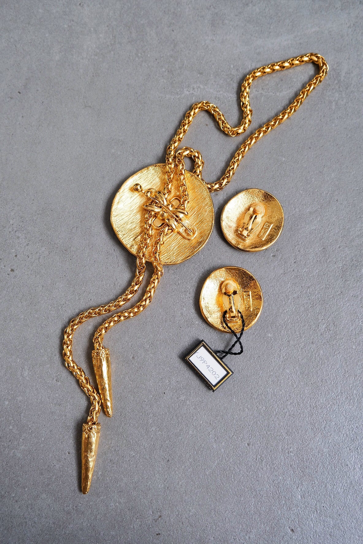 Yves Saint Laurent shell necklace and earclips jewelry set